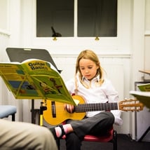 Music classes for 6-9 year olds. Play! Guitar Beginners, The Conservatoire, Loopla